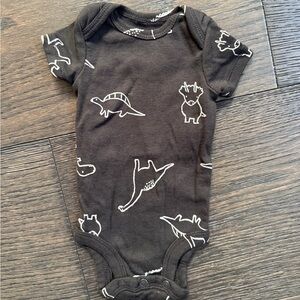 Black dinosaur Cater’s onesie